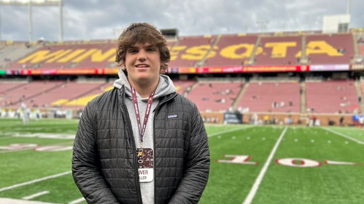 Oliver Miller on an unofficial visit with the Gophers before they played Penn State.
