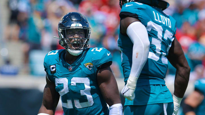 Jacksonville Jaguars linebacker Foyesade Oluokun (23) celebrates with teammate linebacker Devin Lloyd (33) after recovering a Kansas City Chiefs fumble during second quarter action. The Jacksonville Jaguars hosted the Kansas City Chiefs at EverBank Stadium in Jacksonville, FL Sunday, September 17, 2023. [Bob Self/Florida Times-Union]