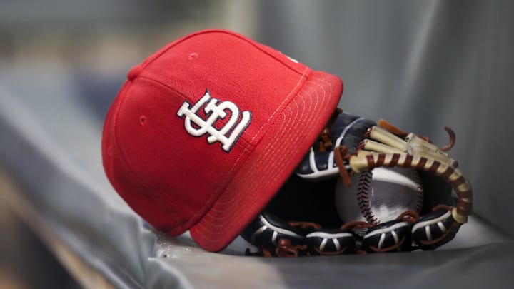 Sep 17, 2018; Atlanta, GA, USA; Detailed view of a St. Louis Cardinals hat and glove in the dugout against the Atlanta Braves in the first inning at SunTrust Park. Mandatory Credit: Brett Davis-Imagn Images
Sep 17, 2018; Atlanta, GA, USA; Detailed view of a St. Louis Cardinals hat and glove in the dugout against the Atlanta Braves in the first inning at SunTrust Park. Mandatory Credit: Brett Davis-Imagn Images