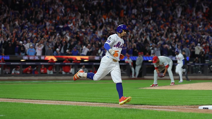 Oct 9, 2024; New York, New York, USA; New York Mets shortstop Francisco Lindor (12) rounds the bases after hitting a grand slam Philadelphia Phillies in the sixth inning in game four of the NLDS for the 2024 MLB Playoffs at Citi Field.