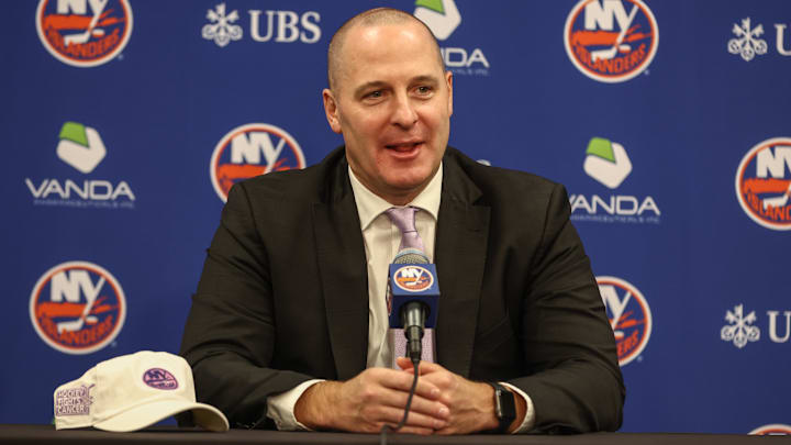 Nov 22, 2025; Elmont, New York, USA; New York Islanders General Manager Mathieu Darche speaks with fans at a pre-game event prior to the game against the St. Louis Blues at UBS Arena. Mandatory Credit: Wendell Cruz-Imagn Images