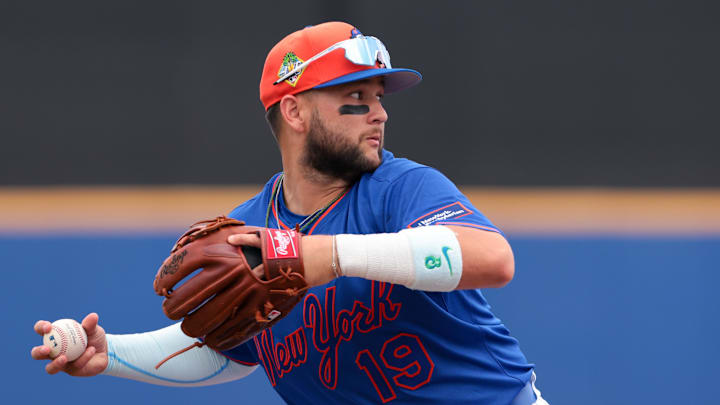 Feb 21, 2026; Port St. Lucie, Florida, USA; New York Mets third baseman Bo Bichette (19) throws to first base but cannot retire Miami Marlins third baseman Connor Norby (not pictured) during the fourth inning at Clover Park. Mandatory Credit: Sam Navarro-Imagn Images