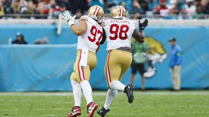 Nov 12, 2023; Jacksonville, Florida, USA; San Francisco 49ers defensive tackle Nick Bosa (97) and defensive tackle Javon Hargrave (98) celebrate a sack against Jacksonville Jaguars during the third quarter at EverBank Stadium. Mandatory Credit: Morgan Tencza-USA TODAY Sports