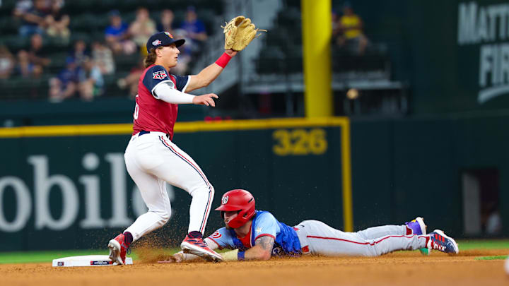Jul 13, 2024; Arlington, TX, USA; National League Future outfielder Dylan Crews (3) steals second base ahead of the tag by American League Future infielder Luke Keaschall (16) during the fifth inning during the Major league All-Star Futures game at Globe Life Field. Jul 13, 2024; Arlington, TX, USA; National League Future outfielder Dylan Crews (3) steals second base ahead of the tag by American League Future infielder Luke Keaschall (16) during the fifth inning during the Major league All-Star Futures game at Globe Life Field.