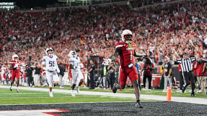 Louisville Cardinals running back Isaac Brown (1) runs into the end zone after a 78-yard gain for a fourth quarter touchdown as the Cards beat James Madison University 28-14 Friday September 5, 2025 at L&N Credit Union Stadium in Louisville, Kentucky. Louisville Cardinals running back Isaac Brown (1) runs into the end zone after a 78-yard gain for a fourth quarter touchdown as the Cards beat James Madison University 28-14 Friday September 5, 2025 at L&N Credit Union Stadium in Louisville, Kentucky.