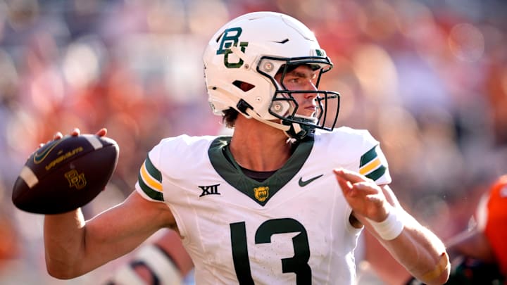 Baylor's Sawyer Robertson (13) throws a pass in the second half of the college football game between the Oklahoma State Cowboys and the Baylor Bears at Boone Pickens Stadium in Stillwater, Okla., Saturday, Sept. 27, 2025.