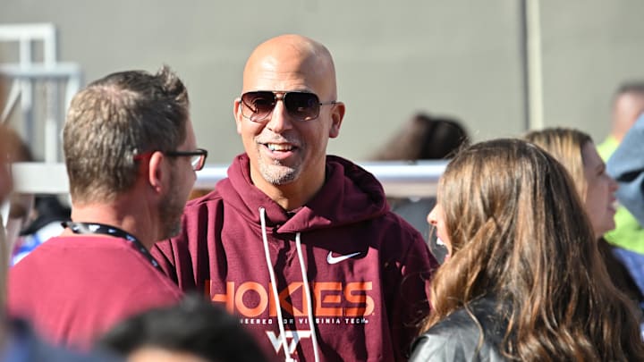 Virginia Tech head coach James Franklin speaks to fans on the sideline before a Hokies game at Lane Stadium. 