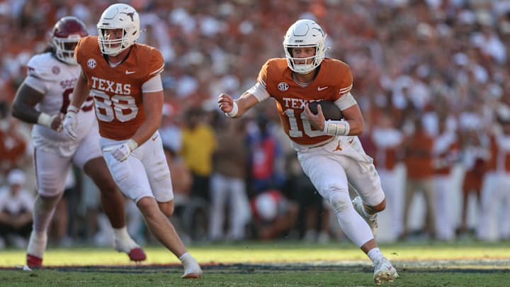 Texas Longhorns quarterback Arch Manning scrambles during his team's 23-6 Week 8 victory over the No. 6 Oklahoma Sooners.