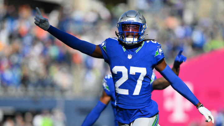 Oct 29, 2023; Seattle, Washington, USA; Seattle Seahawks cornerback Riq Woolen (27) celebrates intercepting a pass against the Cleveland Browns during the first half at Lumen Field.