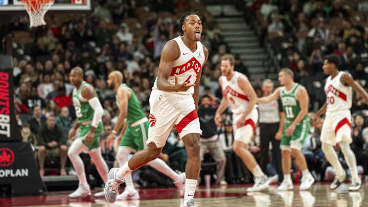 Oct 15, 2024; Toronto, Ontario, CAN;  Toronto Raptors forward Scottie Barnes (4) celebrates scoring against the Boston Celtics during the first half at Scotiabank Arena. Mandatory Credit: Kevin Sousa-Imagn Images