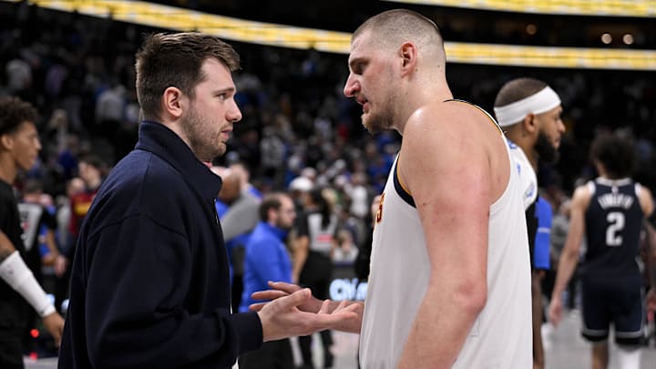 Jan 12, 2025; Dallas, Texas, USA; Dallas Mavericks guard Luka Doncic (left) talks with Denver Nuggets center Nikola Jokic (right) after the game at the American Airlines Center. Mandatory Credit: Jerome Miron-Imagn Images
