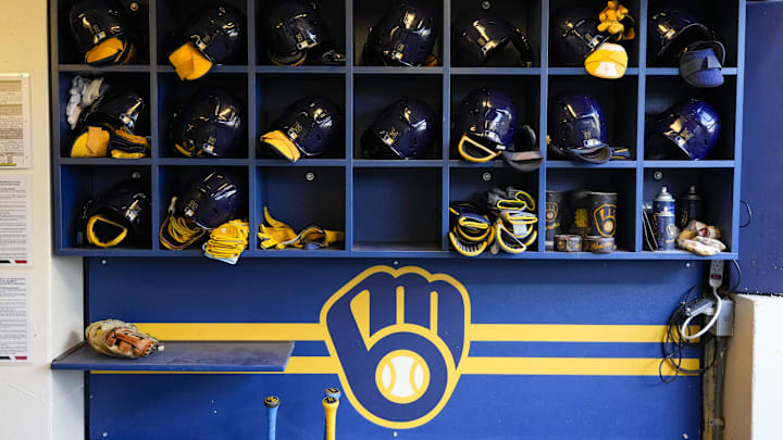 Sep 17, 2024; Milwaukee, Wisconsin, USA; General view of batting helmets inside the Milwaukee Brewers dugout prior to the game against the Philadelphia Phillies at American Family Field. Mandatory Credit: Jeff Hanisch-Imagn Images Sep 17, 2024; Milwaukee, Wisconsin, USA; General view of batting helmets inside the Milwaukee Brewers dugout prior to the game against the Philadelphia Phillies at American Family Field. Mandatory Credit: Jeff Hanisch-Imagn Images