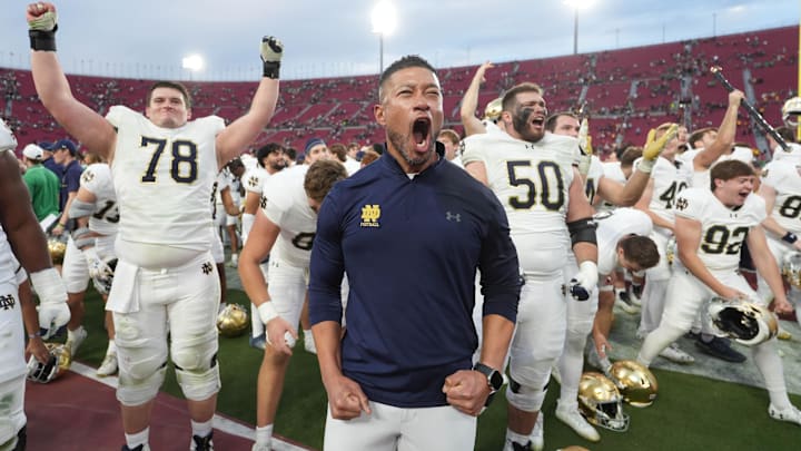 Notre Dame Fighting Irish head coach Marcus Freeman celebrates after a win over USC.