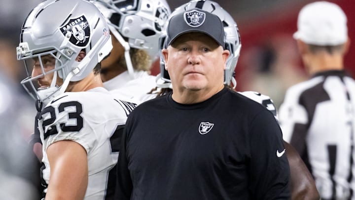 Aug 23, 2025; Glendale, Arizona, USA; Las Vegas Raiders offensive coordinator Chip Kelly against the Arizona Cardinals during a preseason NFL game at State Farm Stadium. Mandatory Credit: Mark J. Rebilas-Imagn Images