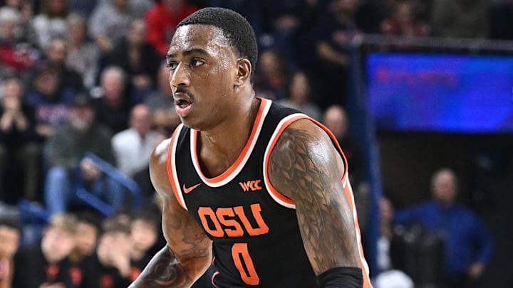 Jan 28, 2025; Spokane, Washington, USA; Oregon State Beavers guard Damarco Minor (0) controls the ball against the Gonzaga Bulldogs in the first half at McCarthey Athletic Center. Mandatory Credit: James Snook-Imagn Images