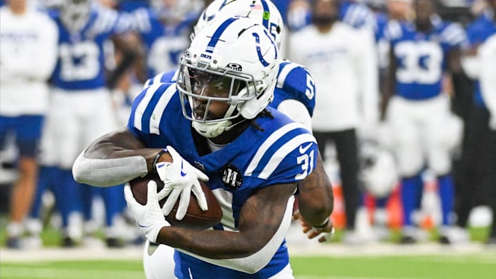 Aug 16, 2025; Indianapolis, Indiana, USA; Indianapolis Colts running back Tyler Goodson (31) runs the ball during the first half against the Green Bay Packers at Lucas Oil Stadium.