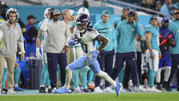 Dec 11, 2023; Miami Gardens, Florida, USA; Tennessee Titans wide receiver DeAndre Hopkins (10) runs