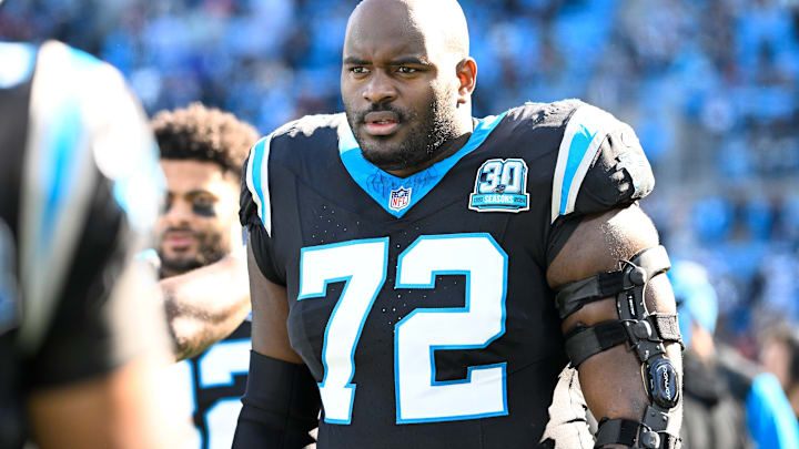 Dec 22, 2024; Charlotte, North Carolina, USA; Carolina Panthers offensive tackle Taylor Moton (72) on the sidelines before the game at Bank of America Stadium. 