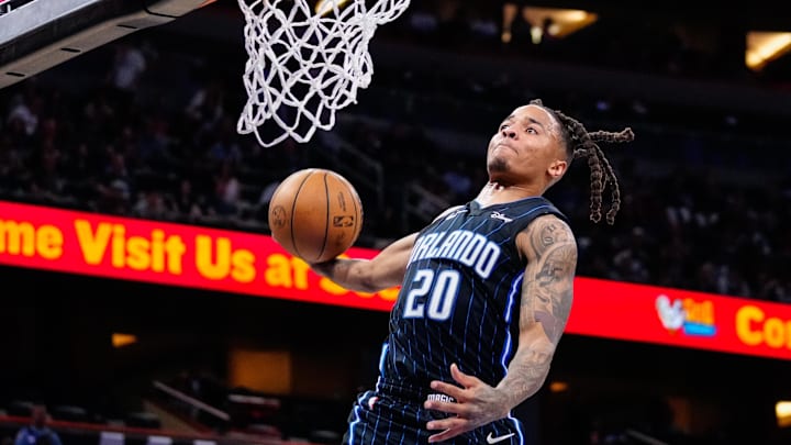 Apr 2, 2023; Orlando, Florida, USA; Orlando Magic guard Markelle Fultz (20) dunks the ball against the Detroit Pistons during the second half at Amway Center. Mandatory Credit: Rich Storry-Imagn Images