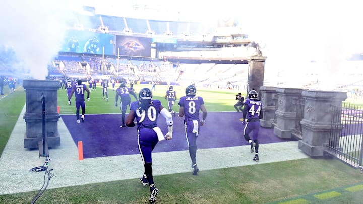 Dec 27, 2020; Baltimore, Maryland, USA; Baltimore Ravens linebacker Pernell McPhee (90), quarterback Lamar Jackson (8) and cornerback Marlon Humphrey (44) run onto the field prior to the game against the New York Giants at M&T Bank Stadium. Mandatory Credit: Evan Habeeb-Imagn Images