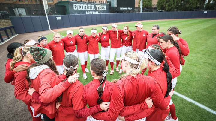 Alabama softball team before first game in 2026 at Buzz Classic
