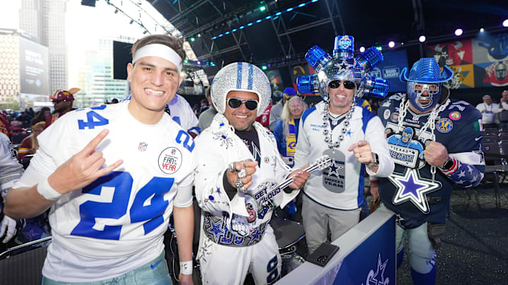 Dallas Cowboys fans pose for a photograph during the 2024 NFL Draft at Campus Martius Park and Hart Plaza. Dallas Cowboys fans pose for a photograph during the 2024 NFL Draft at Campus Martius Park and Hart Plaza.