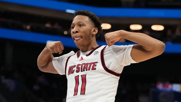 Mar 11, 2026; Charlotte, NC, USA; NC State Wolfpack guard Quadir Copeland (11) reacts after scoring in the second half at Spectrum Center. Mandatory Credit: Bob Donnan-Imagn Images