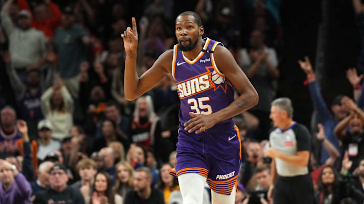 Nov 6, 2024; Phoenix, Arizona, USA; Phoenix Suns forward Kevin Durant (35) celebrates a basket against the Miami Heat during the second half at Footprint Center. Mandatory Credit: Joe Camporeale-Imagn Images