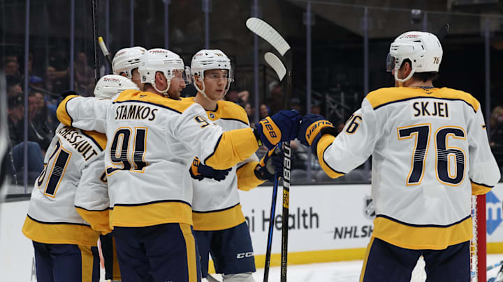 Apr 10, 2025; Salt Lake City, Utah, USA; The Nashville Predators celebrate a goal against the Utah Hockey Club during the third period at Delta Center. Mandatory Credit: Rob Gray-Imagn Images