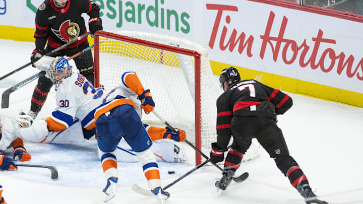 Mar 19, 2026; Ottawa, Ontario, CAN;  Ottawa Senators left. wing Brady Tkachuk (7) shoots the winning goal against New York Islanders goalie Ilya Sorokin (30) in the third period at the Canadian Tire Centre. Mandatory Credit: Marc DesRosiers-IMAGN Images