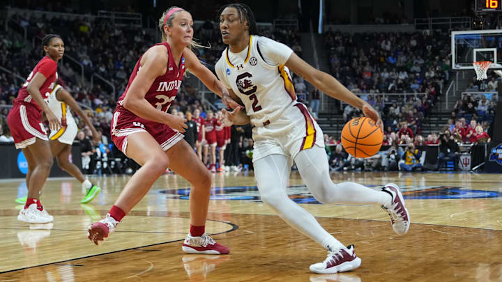 South Carolina Gamecocks forward Ashlyn Watkins (2) dribbles the ball against Indiana Hoosiers guard Sydney Parrish (33) during the second half in the semifinals of the Albany Regional of the 2024 NCAA Tournament at the MVP Arena.