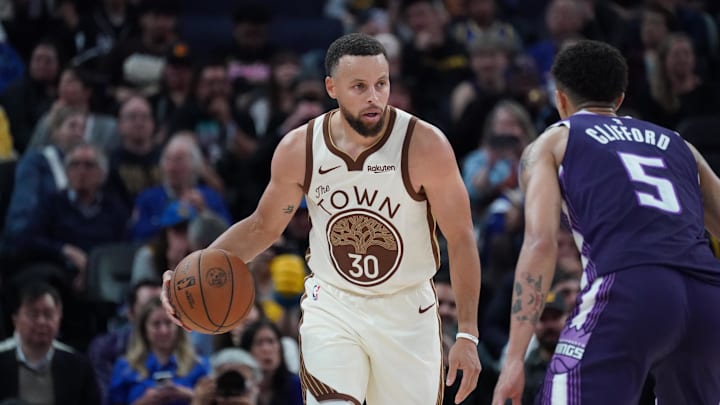 Apr 7, 2026; San Francisco, California, USA; Golden State Warriors guard Stephen Curry (30) dribbles upcourt while defended by Sacramento Kings guard Nique Clifford (5) in the fourth quarter at Chase Center. Apr 7, 2026; San Francisco, California, USA; Golden State Warriors guard Stephen Curry (30) dribbles upcourt while defended by Sacramento Kings guard Nique Clifford (5) in the fourth quarter at Chase Center.