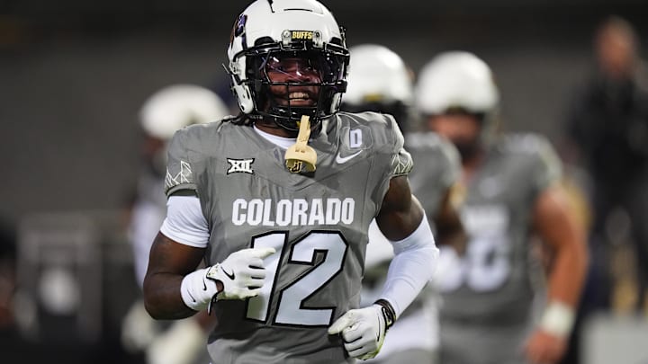 Colorado Buffaloes wide receiver Travis Hunter (12) reacts after touchdown reception in the first quarter against the Cincinnati Bearcats at Folsom Field. 