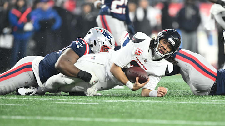 Jan 18, 2026; Foxborough, MA, USA; Houston Texans quarterback C.J. Stroud (7) is sacked in the second quarter against the New England Patriots in an AFC Divisional Round game at Gillette Stadium. Mandatory Credit: Brian Fluharty-Imagn Images Jan 18, 2026; Foxborough, MA, USA; Houston Texans quarterback C.J. Stroud (7) is sacked in the second quarter against the New England Patriots in an AFC Divisional Round game at Gillette Stadium. Mandatory Credit: Brian Fluharty-Imagn Images
