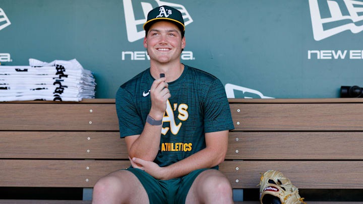 Jul 28, 2025; West Sacramento, California, USA; Athletics 2025 1st round draft pick Jamie Arnold speaks with members of the media before the game against the Seattle Mariners at Sutter Health Park. Mandatory Credit: Sergio Estrada-Imagn Images Jul 28, 2025; West Sacramento, California, USA; Athletics 2025 1st round draft pick Jamie Arnold speaks with members of the media before the game against the Seattle Mariners at Sutter Health Park. Mandatory Credit: Sergio Estrada-Imagn Images