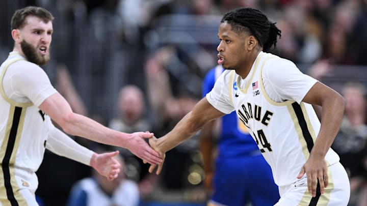 Purdue Boilermakers guard Braden Smith (3) and guard Gicarri Harris (24) celebrate after a play Purdue Boilermakers guard Braden Smith (3) and guard Gicarri Harris (24) celebrate after a play
