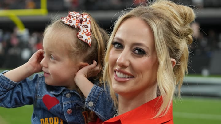 Brittany Mahomes, the wife of Kansas City Chiefs quarterback Patrick Mahomes (15) holds daughter Sterling Mahomes during the game against the Las Vegas Raiders at Allegiant Stadium.
