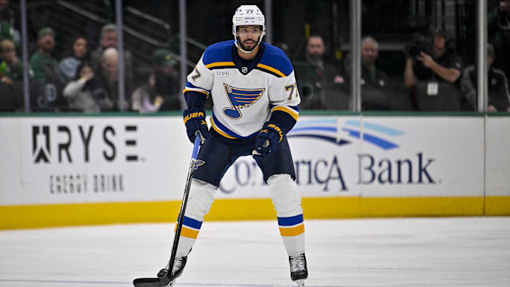 Dec 14, 2024; Dallas, Texas, USA; St. Louis Blues defenseman Pierre-Olivier Joseph (77) in action during the game between the Dallas Stars and the St. Louis Blues at American Airlines Center. Mandatory Credit: Jerome Miron-Imagn Images