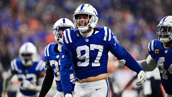 Sep 22, 2024; Indianapolis, Indiana, USA; Indianapolis Colts defensive end Laiatu Latu (97) celebrates a sack during the second half against the Chicago Bears at Lucas Oil Stadium. Mandatory Credit: Marc Lebryk-Imagn Images

