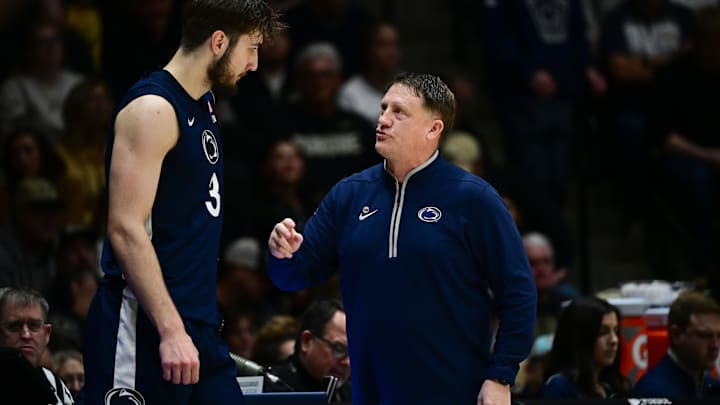 Penn State Nittany Lions head coach Mike Rhoades has a moment with forward Ivan Juric during the first half against the Purdue Boilermakers at Mackey Arena. 