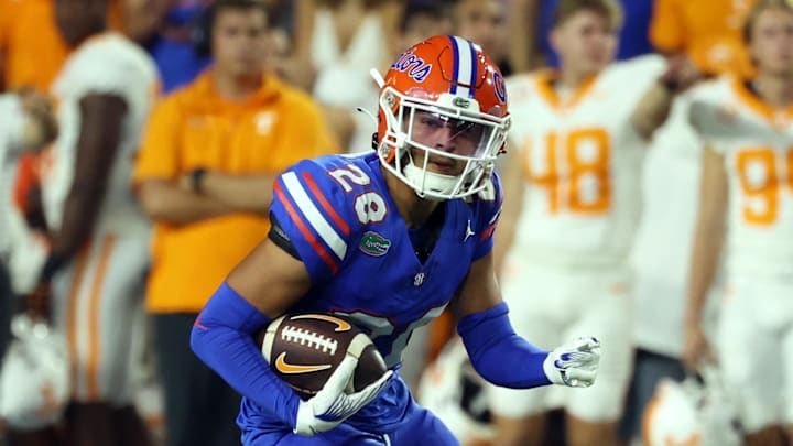 Florida Gators cornerback Devin Moore (28) intercepted the ball against the Tennessee Volunteers  during the second quarter at Ben Hill Griffin Stadium. Mandatory Credit: Kim Klement Neitzel-Imagn Images