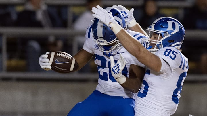 Oct 4, 2025; Berkeley, California, USA; Duke Blue Devils running back Nate Sheppard (20) and tight end Jeremiah Hasley (85) celebrate Sheppard’s touchdown run against the California Golden Bears during the first quarter at California Memorial Stadium. Mandatory Credit: D. Ross Cameron-Imagn Images