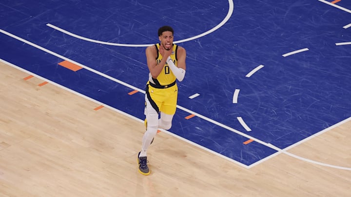 May 21, 2025; New York, New York, USA; Indiana Pacers guard Tyrese Haliburton (0) reacts after tying the game in the fourth quarter to send the game to overtime against the New York Knicks during game one of the eastern conference finals for the 2025 NBA Playoffs at Madison Square Garden. Mandatory Credit: Brad Penner-Imagn Images