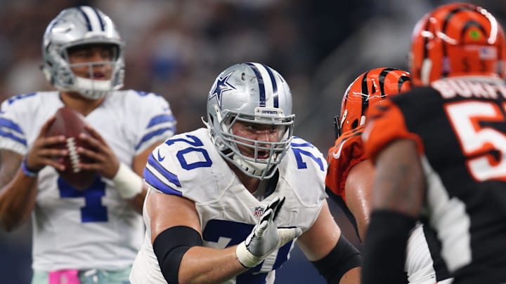 Oct 9, 2016; Arlington, TX, USA; Dallas Cowboys guard Zack Martin (70) blocks in front of quarterback Dak Prescott (4) during the second quarter against the Cincinnati Bengals at AT&T Stadium. Mandatory Credit: Matthew Emmons-Imagn Images