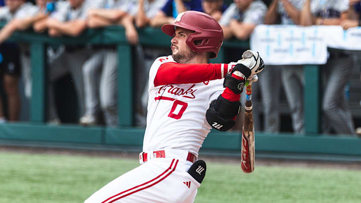 Nebraska second baseman Cayden Brumbaugh launches a home run against Holy Cross in the Chapel Hill Regional.
