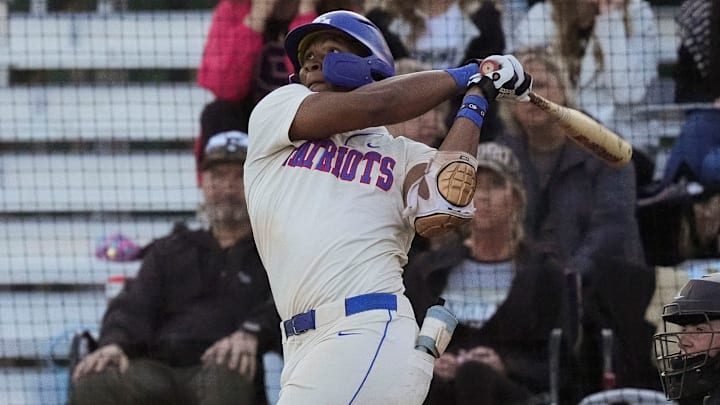 ACA hitter Eric Hines connects with a pitch during the game with Scottsboro at American Christian Academy in the AHSAA baseball playoffs.