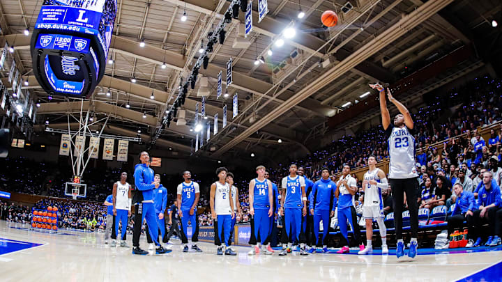Oct 3, 2025; Durham, NC, USA; Duke Blue Devils Associate Head Coach Chris Carrawell shoots the ball during the Countdown to Craziness at the Cameron Indoor Stadium. Mandatory Credit: Jaylynn Nash-Imagn Images Oct 3, 2025; Durham, NC, USA; Duke Blue Devils Associate Head Coach Chris Carrawell shoots the ball during the Countdown to Craziness at the Cameron Indoor Stadium. Mandatory Credit: Jaylynn Nash-Imagn Images