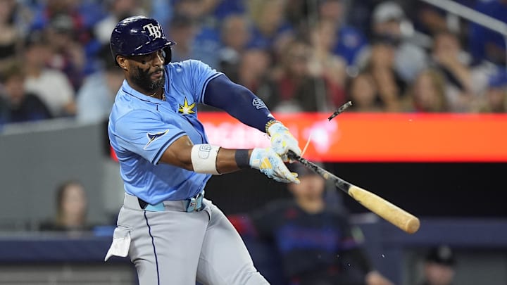 Sep 26, 2025; Toronto, Ontario, CAN; Tampa Bay Rays designated hitter Yandy Diaz (2) breaks his bat on a fly ball hit to right field against theToronto Blue Jays during the eighth inning at Rogers Centre. Mandatory Credit: John E. Sokolowski-Imagn Images