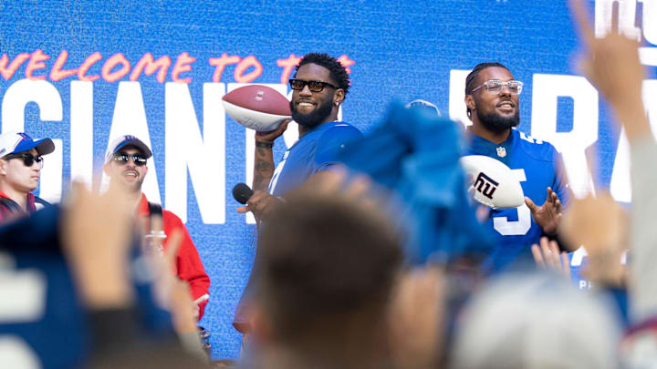 Apr 25, 2024; East Rutherford, NJ, USA; (Left) NY Giants #0 Brian Burns and #5 Kayvon Thibodeaux
