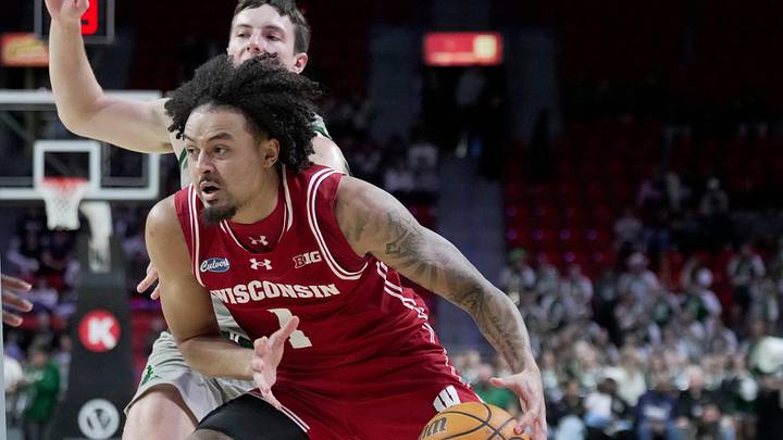 Wisconsin guard Braeden Carrington (1) drives to the basket during the first half of their preseason game against UW-Green Bay Thursday, Oct. 15, 2026 at the Resch Center in Green Bay, Wisconsin.